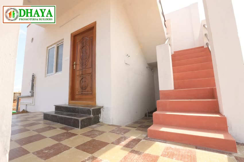 Entrance with carved teak door